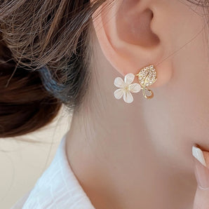 1 pair simple style leaves flower inlay alloy rhinestones gold plated drop earrings