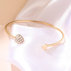 Nihao Wholesale elegant heart shape twist alloy plating inlay rhinestones rose gold plated women's cuff bracelets