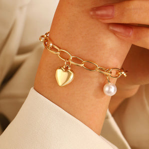 Nihao Wholesale Simple Style Commute Heart Shape Gold Plated Alloy Wholesale Bracelets