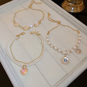 Nihao Wholesale Elegant Heart Shape Flower Shell Mixed materials Plating Inlay Rhinestones Opal Zircon Women'S Bracelets